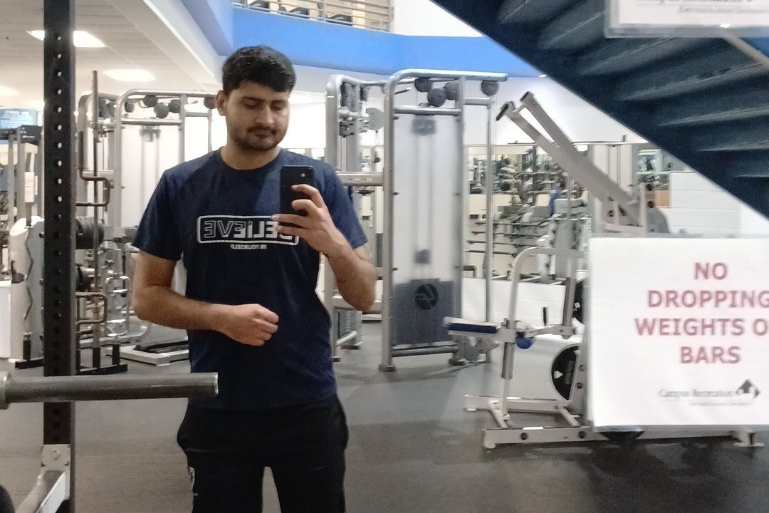 Zubair Zafar in the campus recreation weight room